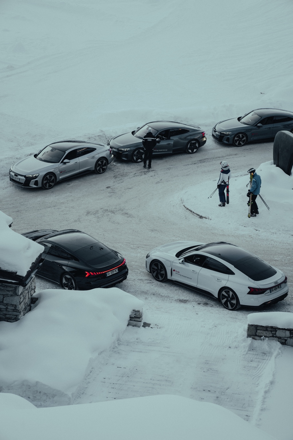 Audi driving experience cars parked in the snow for Fusalp X Audi