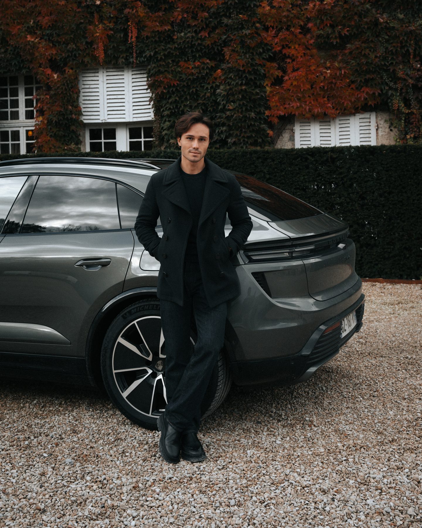 Porsche lifestyle portrait beside the car