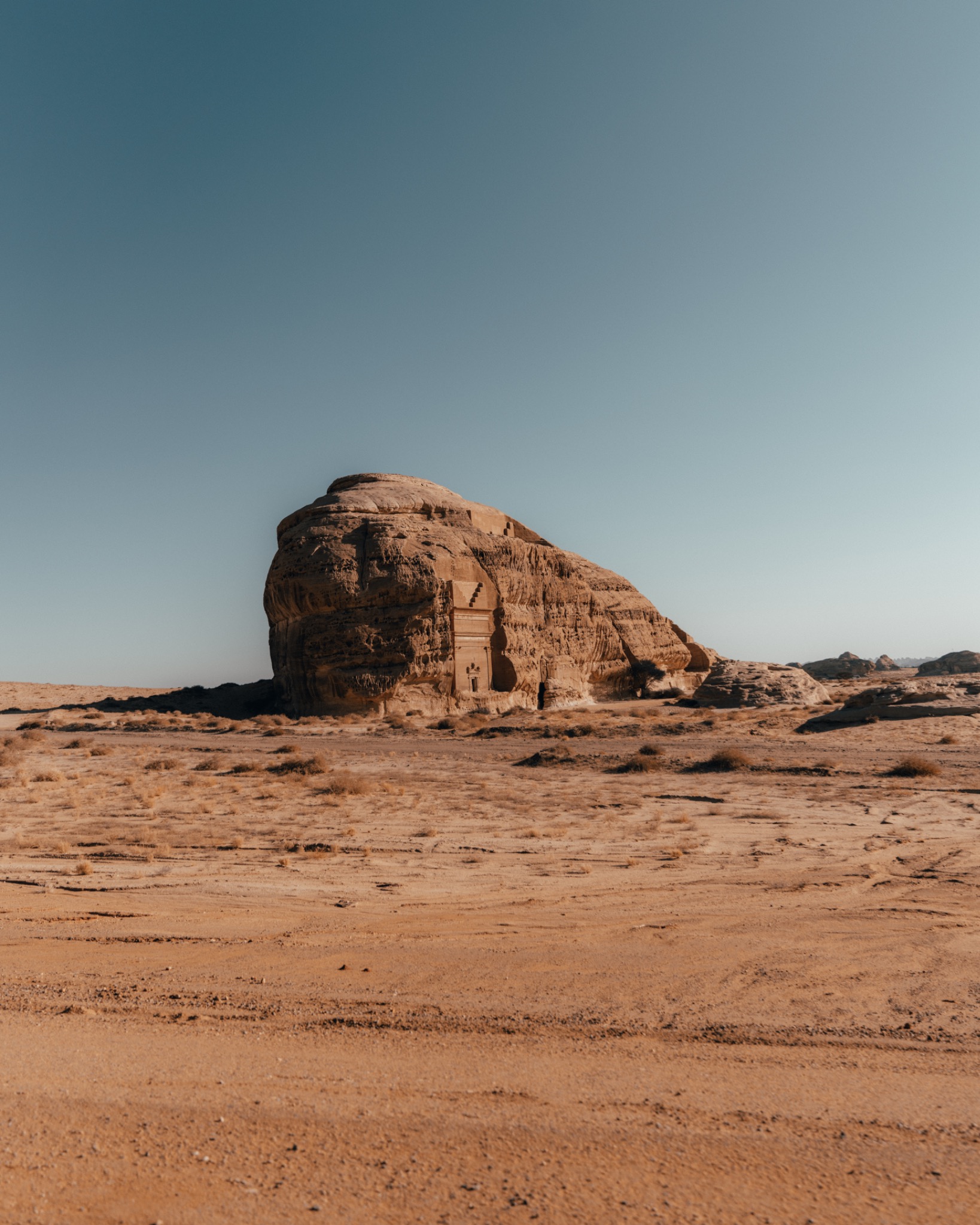 Visit Saudi rock formation under a clear sky