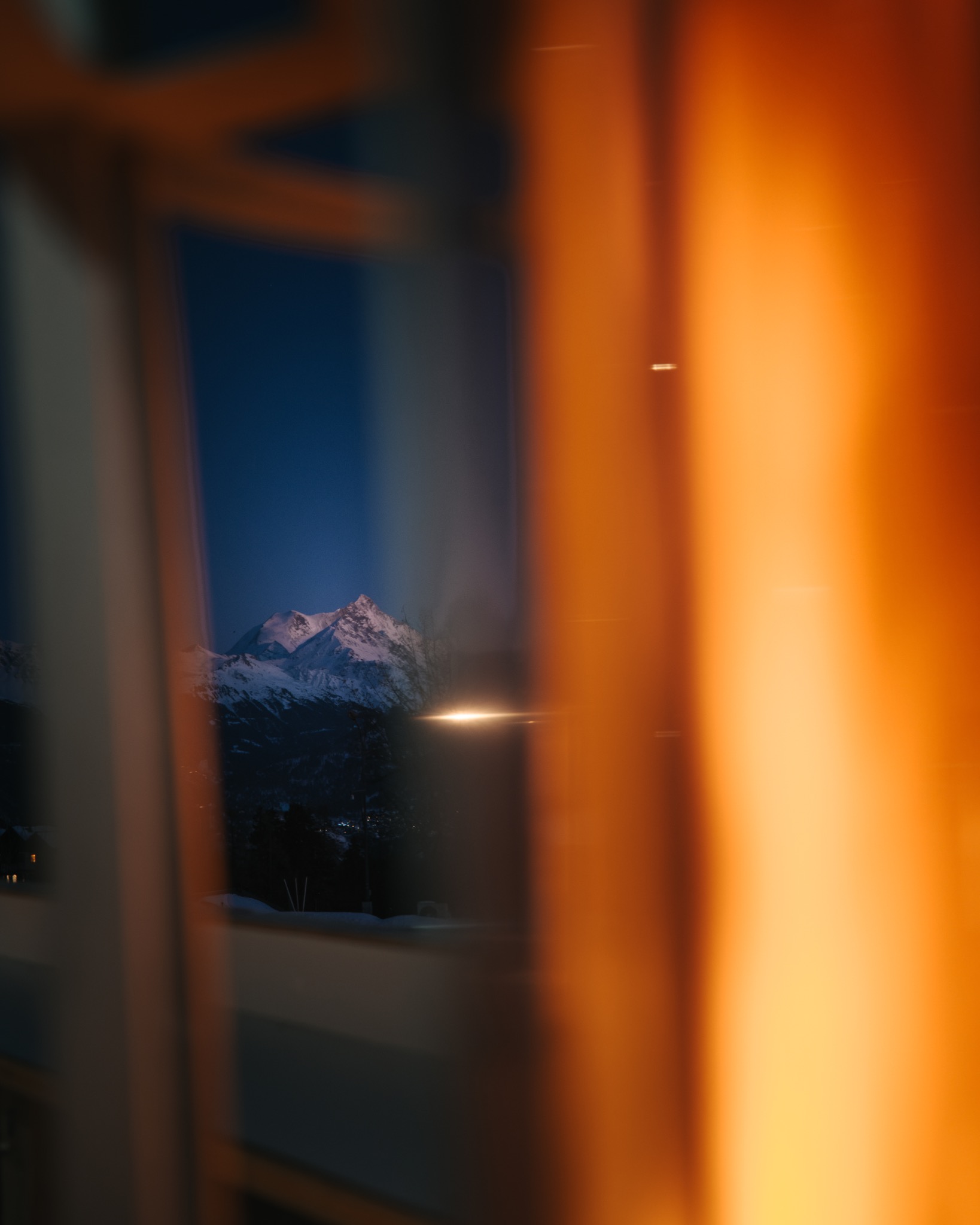 Six Senses Crans-Montana mountain view at night