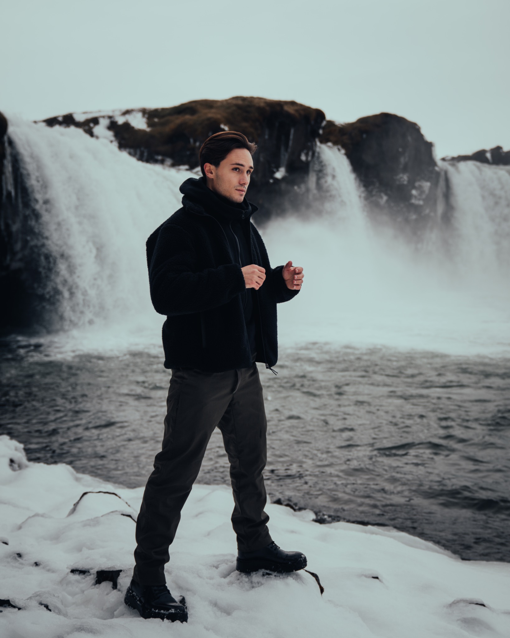 Portrait in front of a waterfall during the Skoda trip