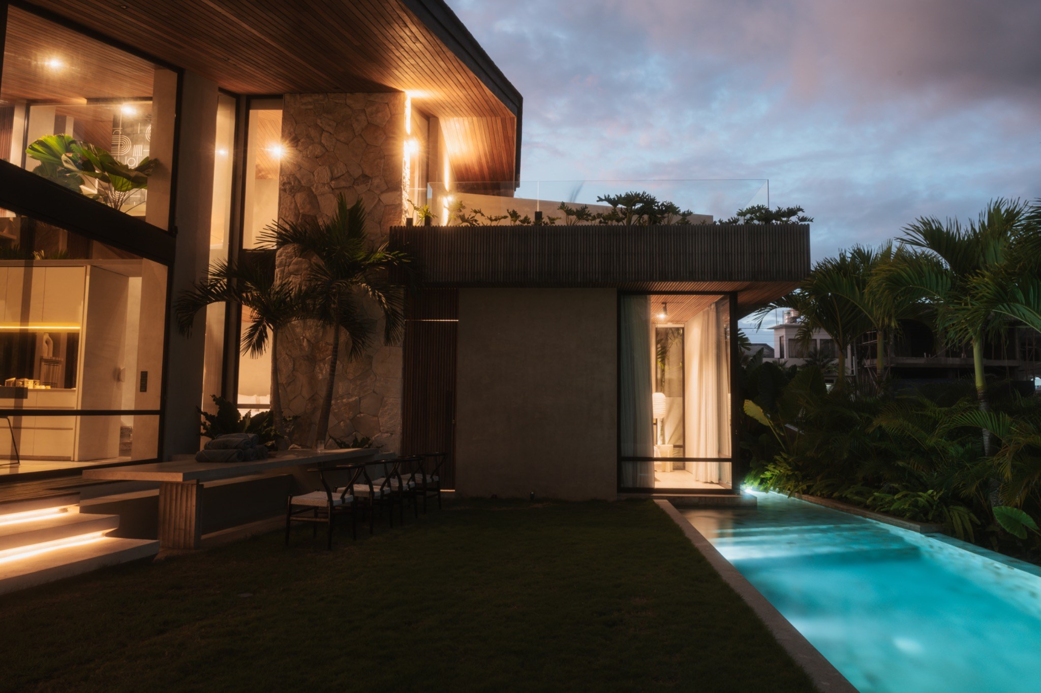 Villa Caligo night exterior with pool
